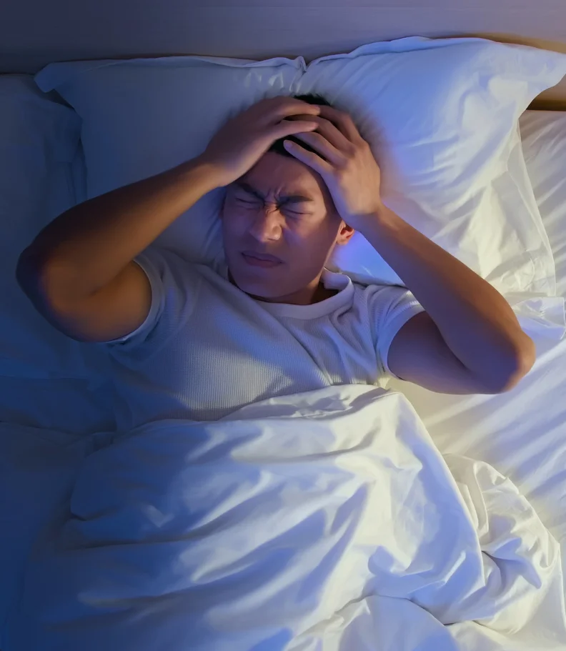 man experiencing headaches in Raleigh NC